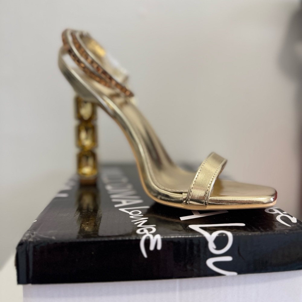 Gold Heeled Sandals  never used , has its box